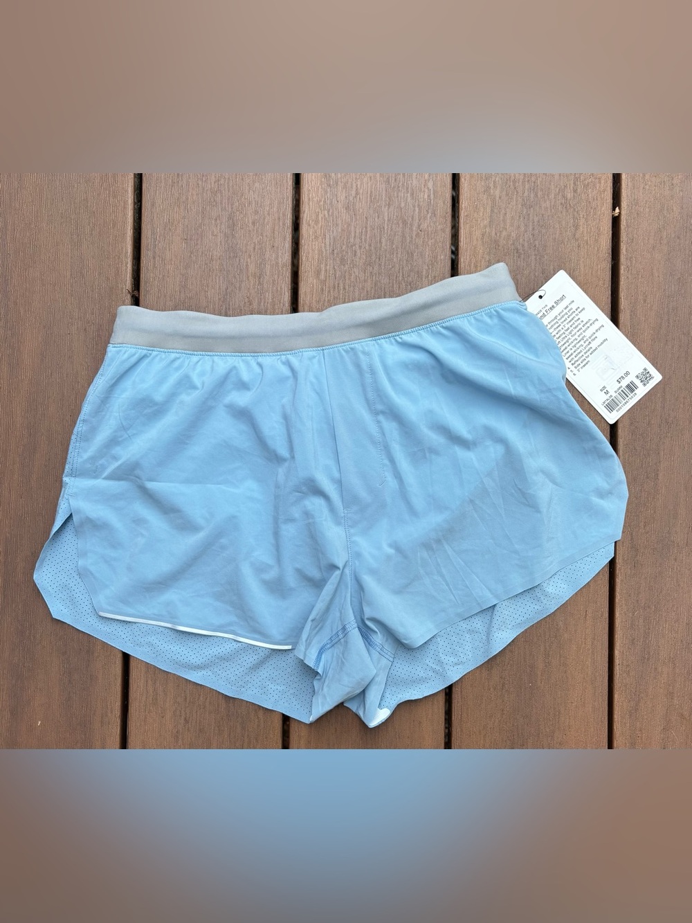 Light Blue Athletic Shorts with Gray Waistband